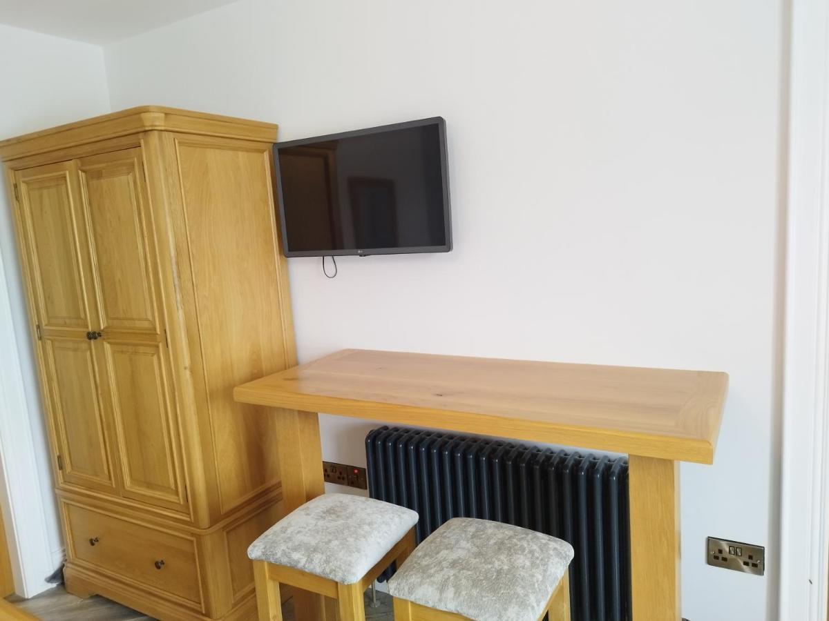 Biddy Ban’s Hotel Carnmalin Bagian luar foto